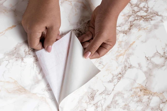 peel and stick wallpaper installation close up